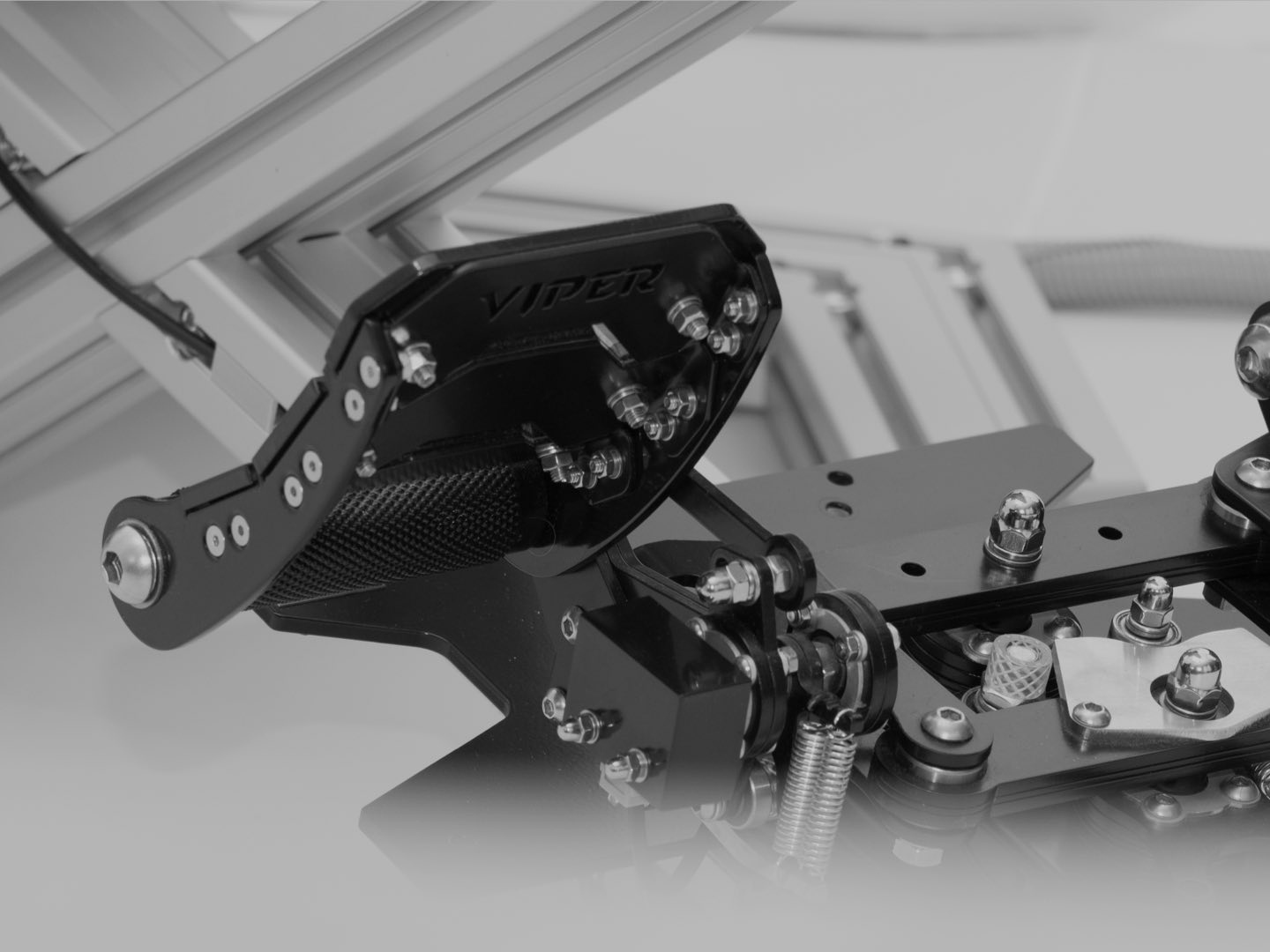 The ONYXJET MK3 flight simulator cockpit frame is equipped with RX Viper V2 full metal rudder pedals by Slaw Device
